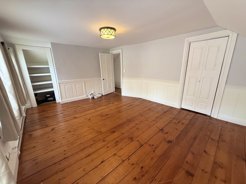 59 Brookfield Road Sturbridge, MA 01518 - Photo 32 of 40 a view of empty room with wooden floor