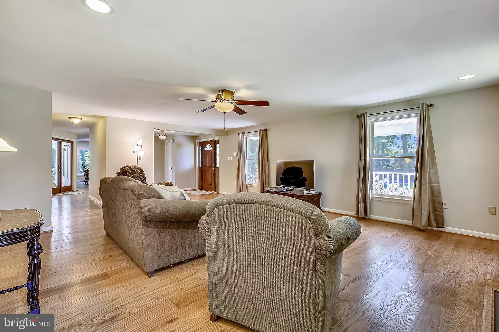 22005 Ridge View Drive Boyds, MD 20841 - Photo 11 of 56 THE GREAT ROOM WITH GLEAMING WOOD FLOORS