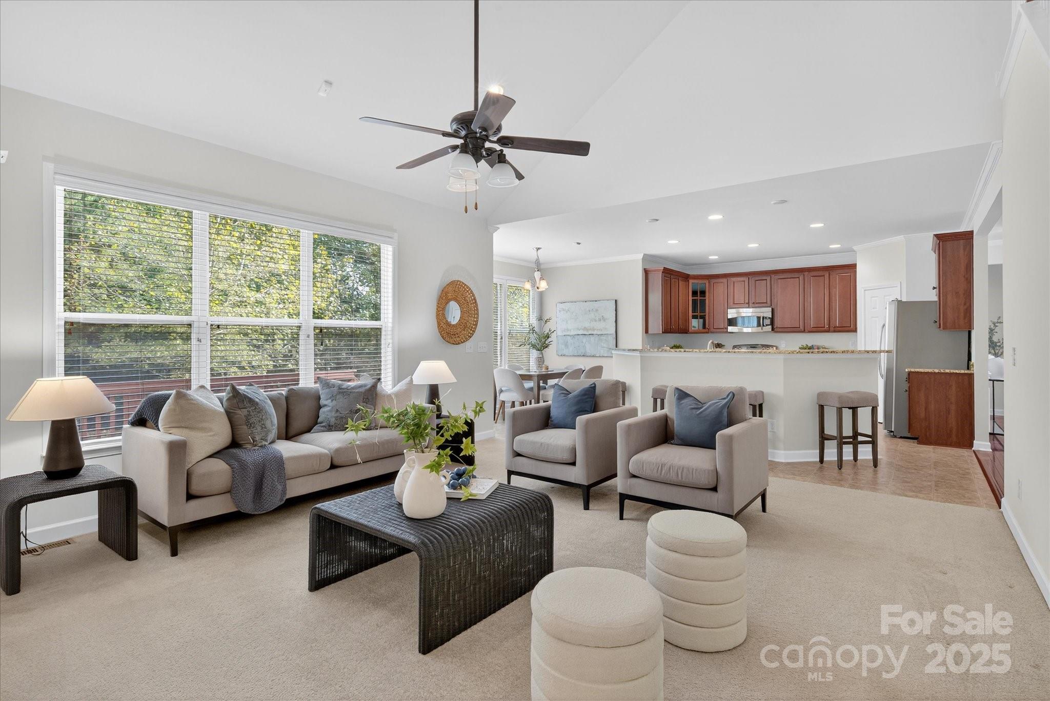 945 Vogel Way Fort Mill, SC 29715 - Photo 26 of 47 a living room with furniture and a large window