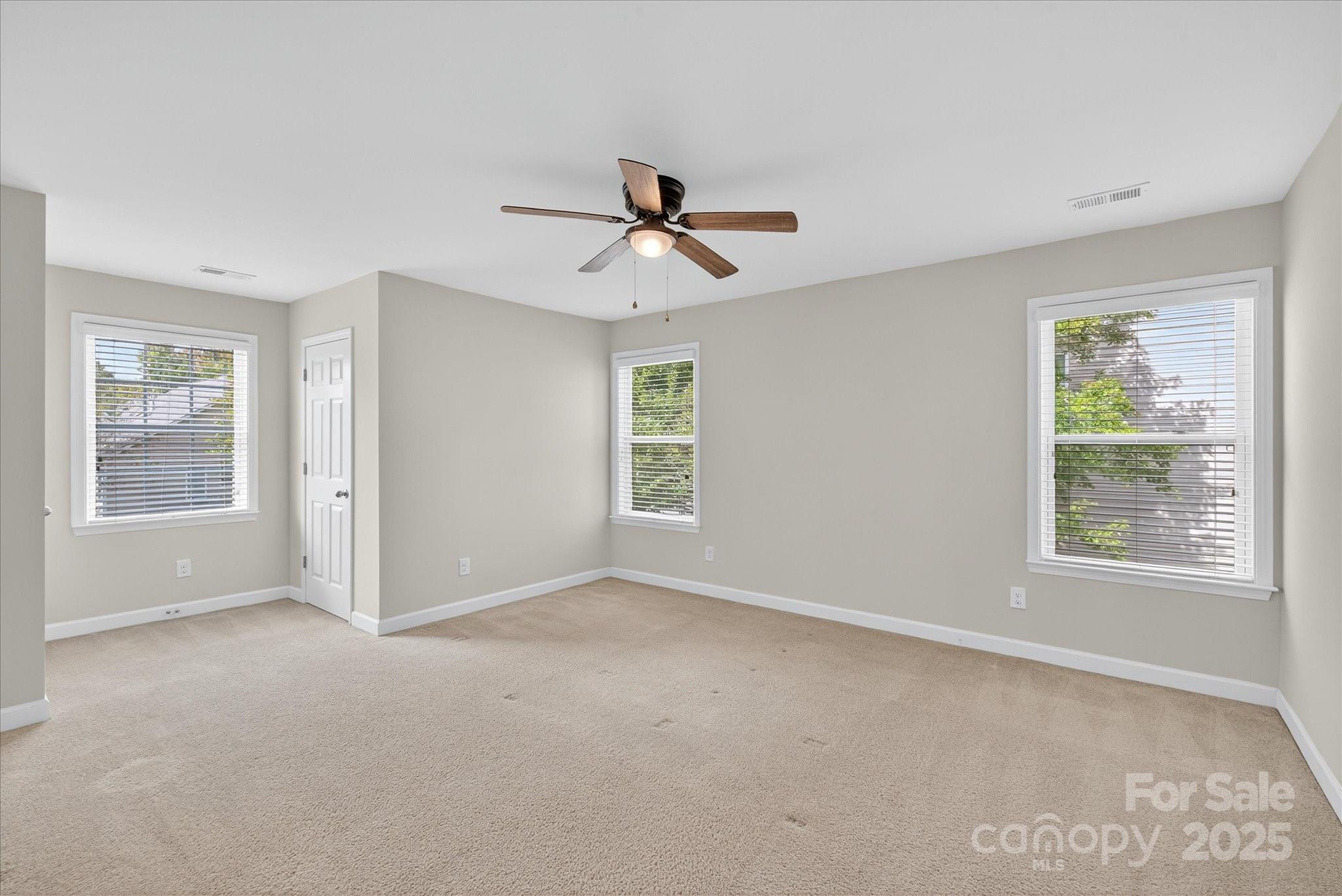 945 Vogel Way Fort Mill, SC 29715 - Photo 31 of 47 a view of an empty room with a window