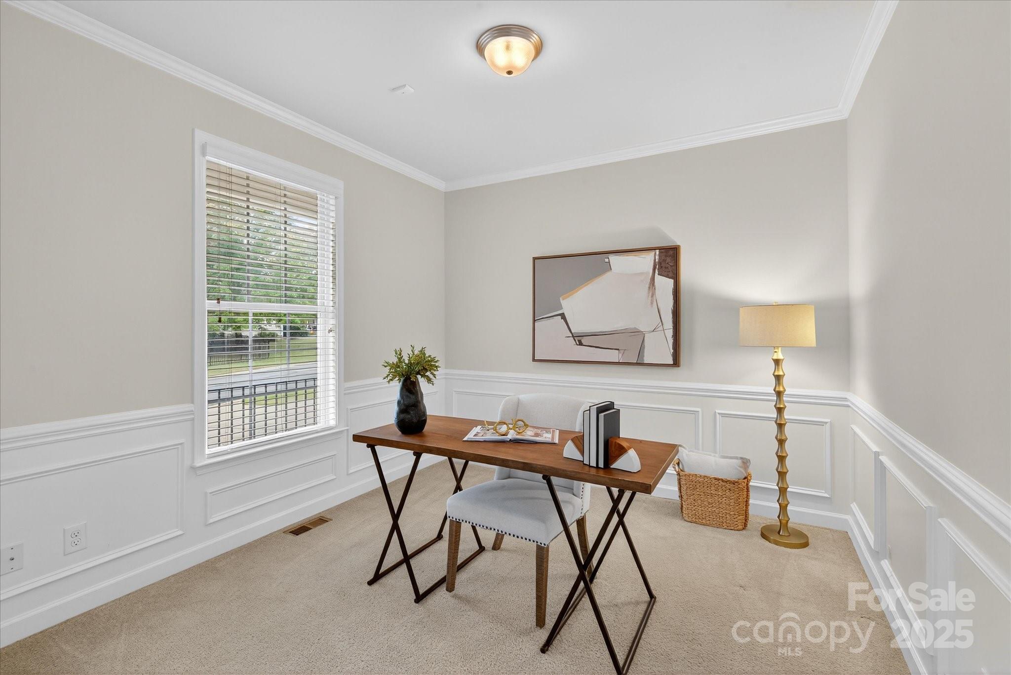 945 Vogel Way Fort Mill, SC 29715 - Photo 7 of 47 a view of a workspace with furniture and a window
