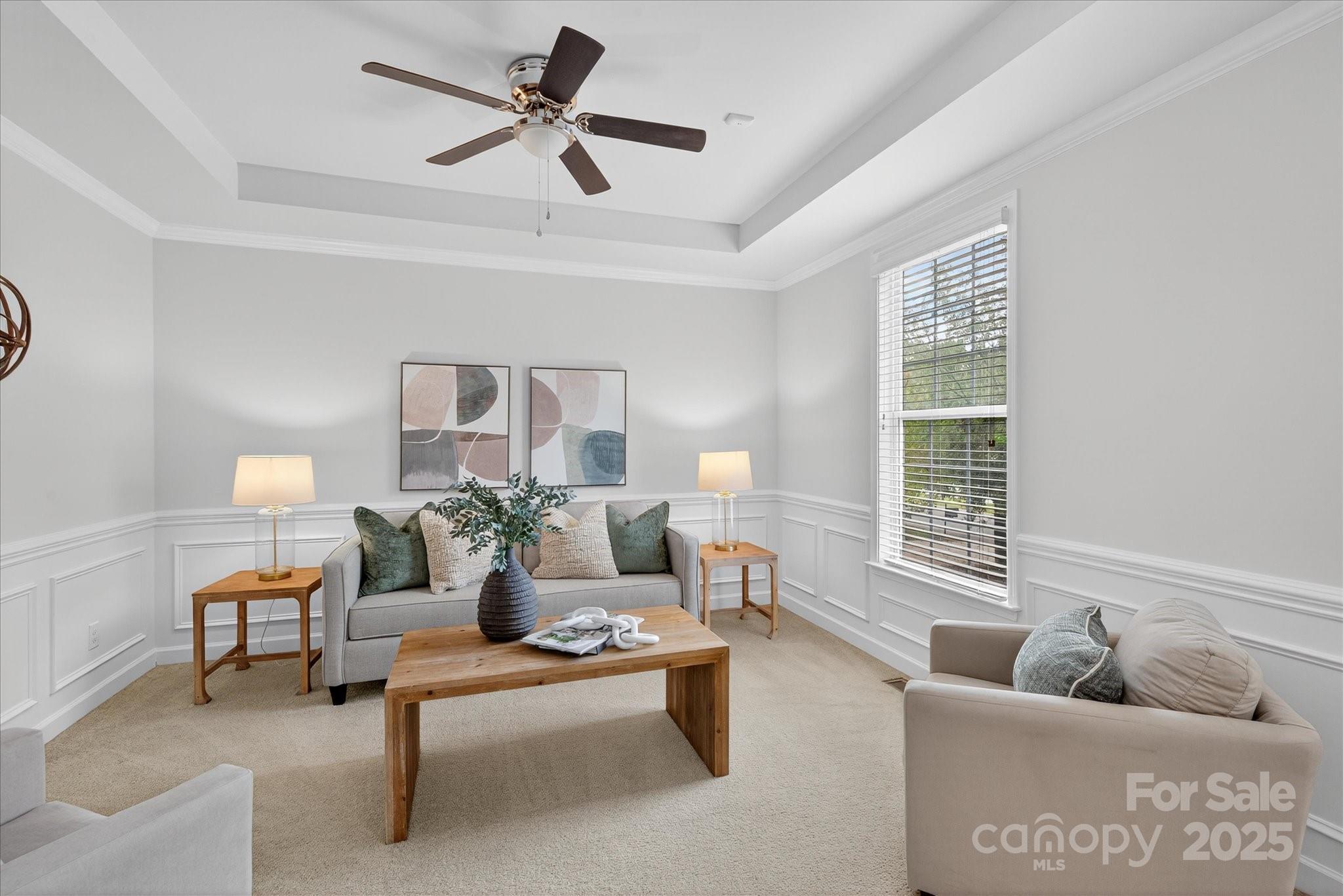 945 Vogel Way Fort Mill, SC 29715 - Photo 8 of 47 a living room with furniture and a large window