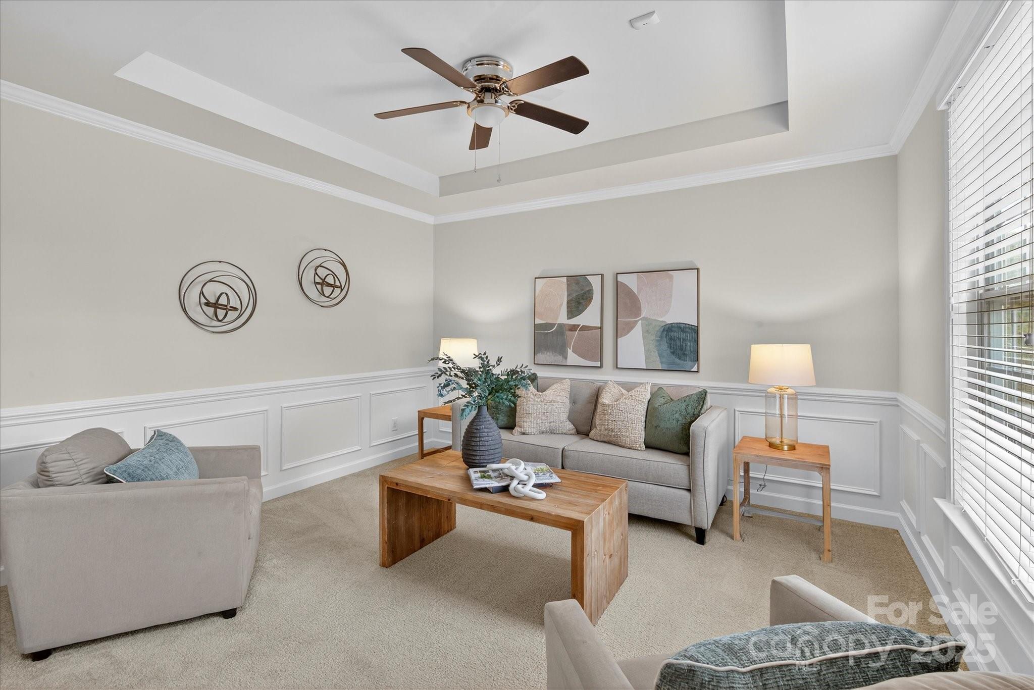 945 Vogel Way Fort Mill, SC 29715 - Photo 9 of 47 a living room with furniture and a window