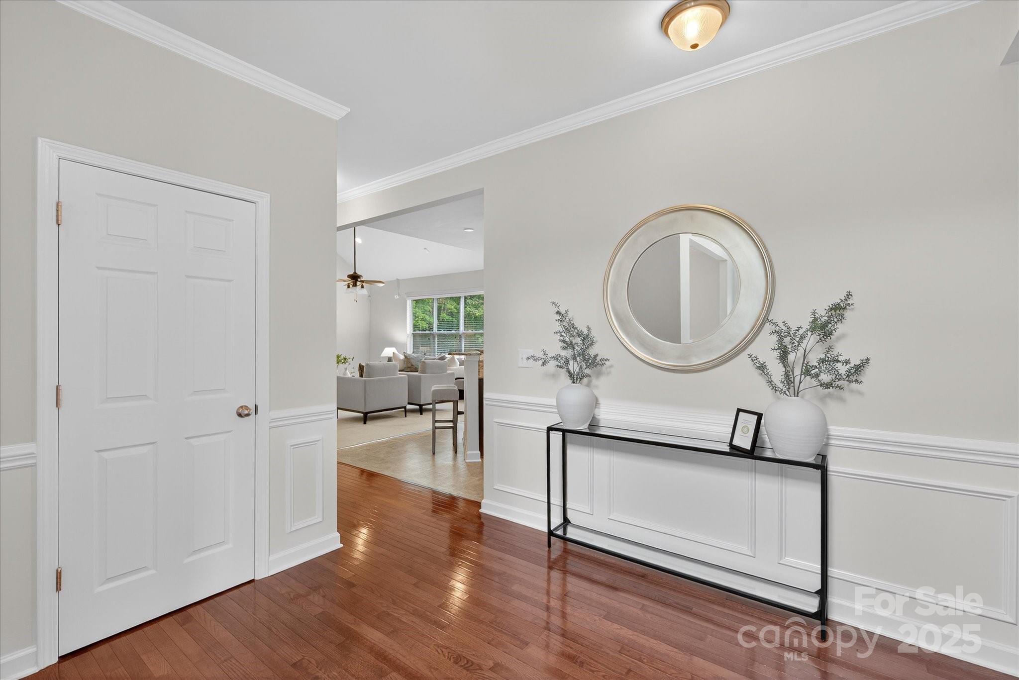 945 Vogel Way Fort Mill, SC 29715 - Photo 10 of 47 a view of a room with wooden floor mirror and window