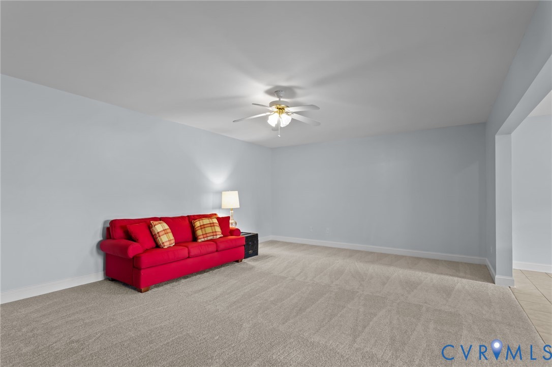 16431 River Road Chesterfield, VA 23838 - Photo 40 of 49 a room with a bed and a couch