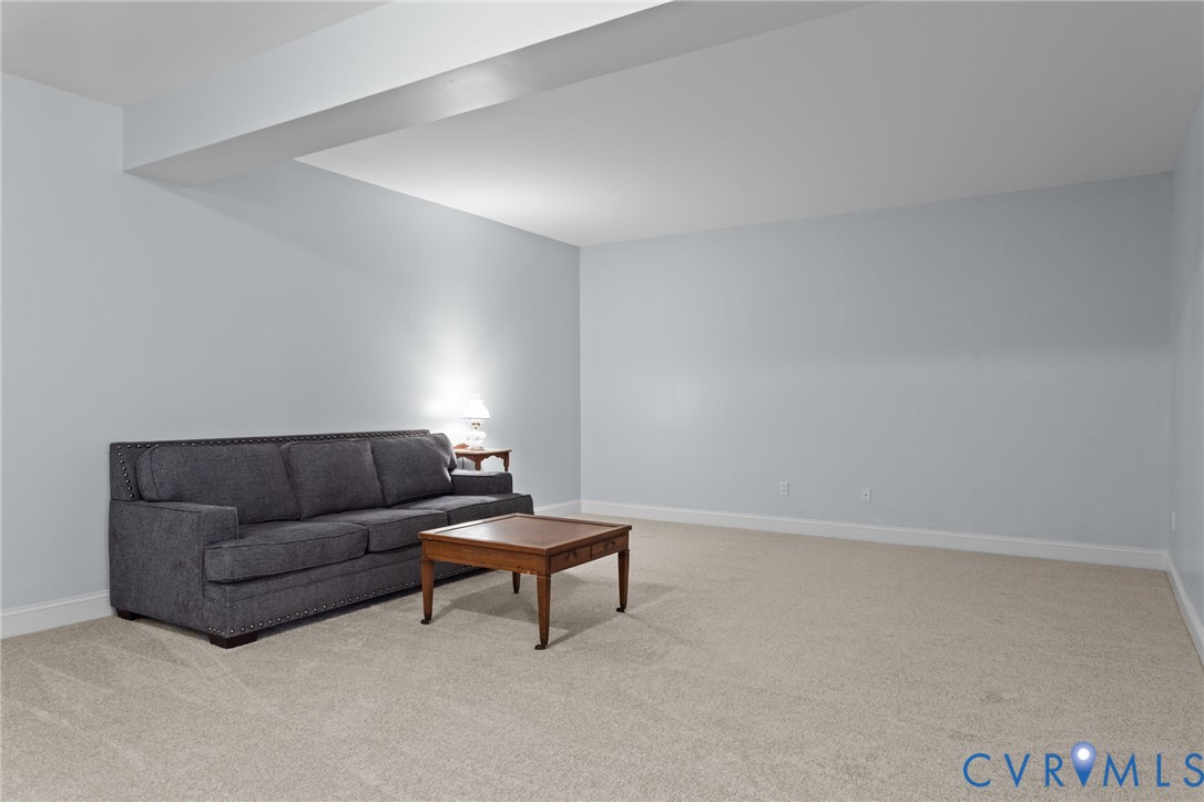 16431 River Road Chesterfield, VA 23838 - Photo 42 of 49 a living room with furniture and a lamp