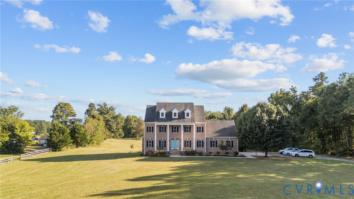 16431 River Road Chesterfield, VA 23838 - Photo 5 of 49 a view of a large body of water with a building in the background