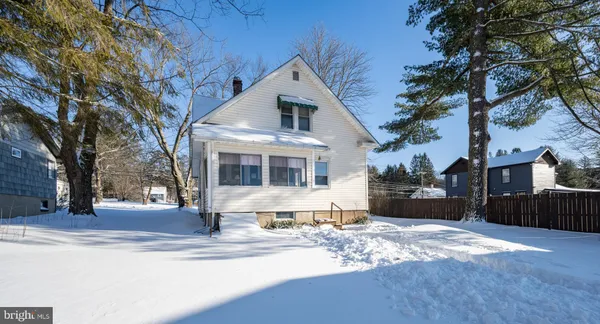 a view of a room with a large window