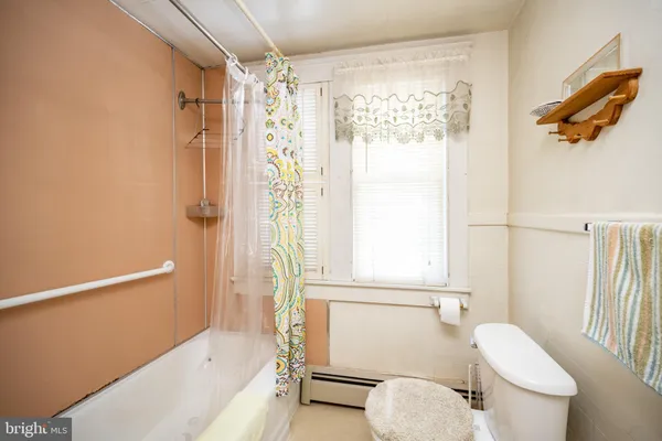 a view of a big room with wooden floor