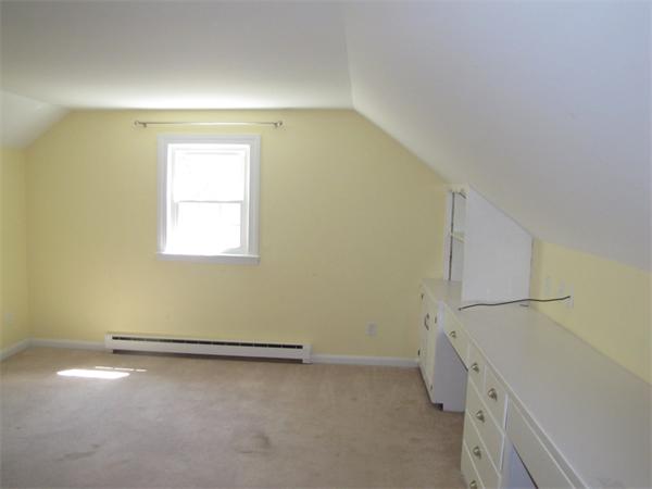 66 Harvard Road Stow, MA 01775 - Photo 24 of 30 an empty room with a empty space and windows