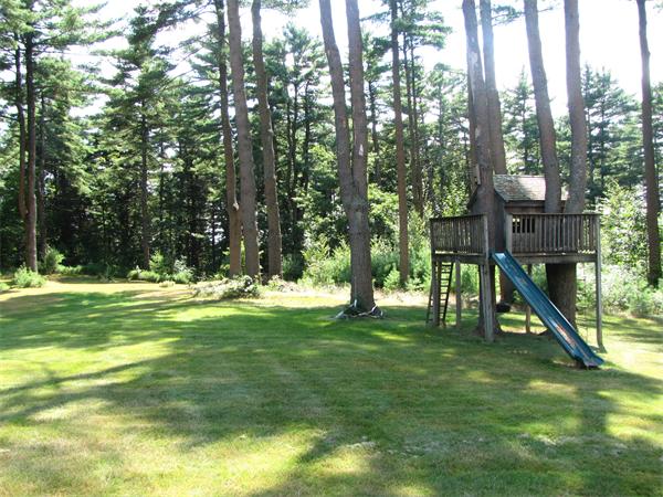 66 Harvard Road Stow, MA 01775 - Photo 30 of 30 a view of a park with a slide