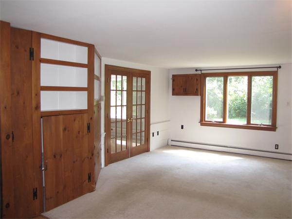 66 Harvard Road Stow, MA 01775 - Photo 6 of 30 an empty room with windows