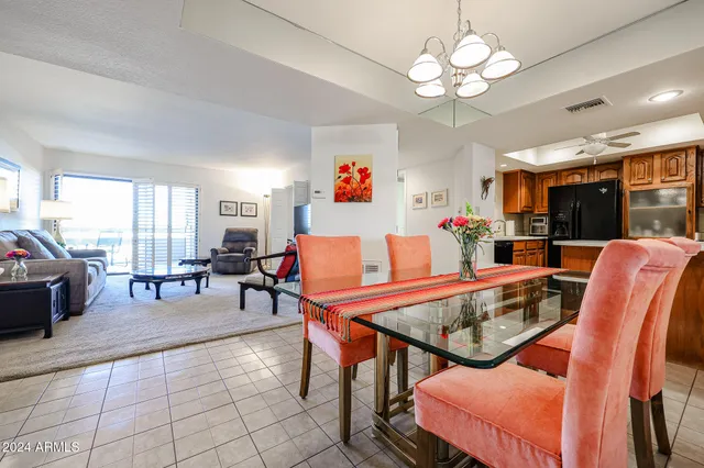 a dining room filled counter top space and stainless steel appliances