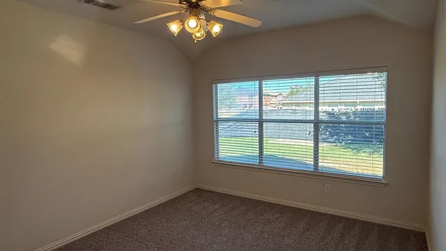 a kitchen with stainless steel appliances a sink and a refrigerator