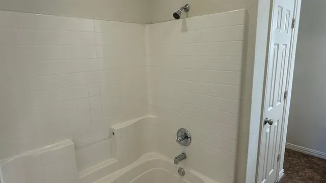 a bathroom with a bathtub