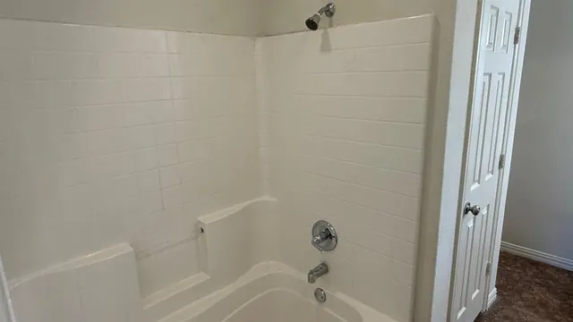 a bathroom with a bathtub