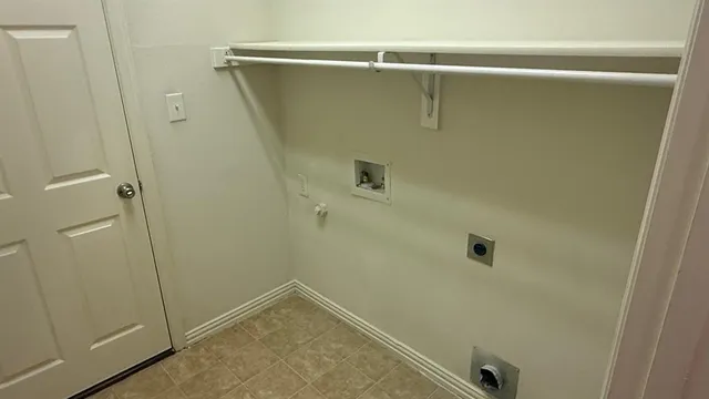 a bathroom with a sink mirror vanity and toilet