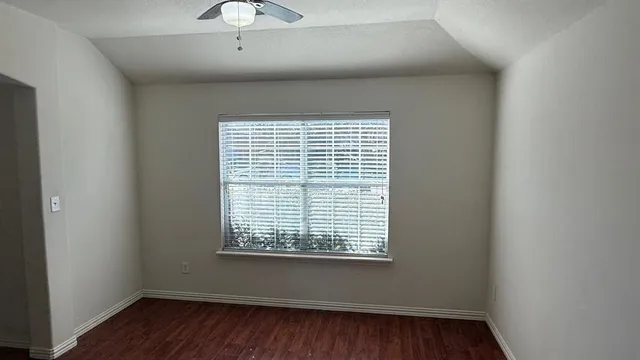 a kitchen with a sink and chandelier