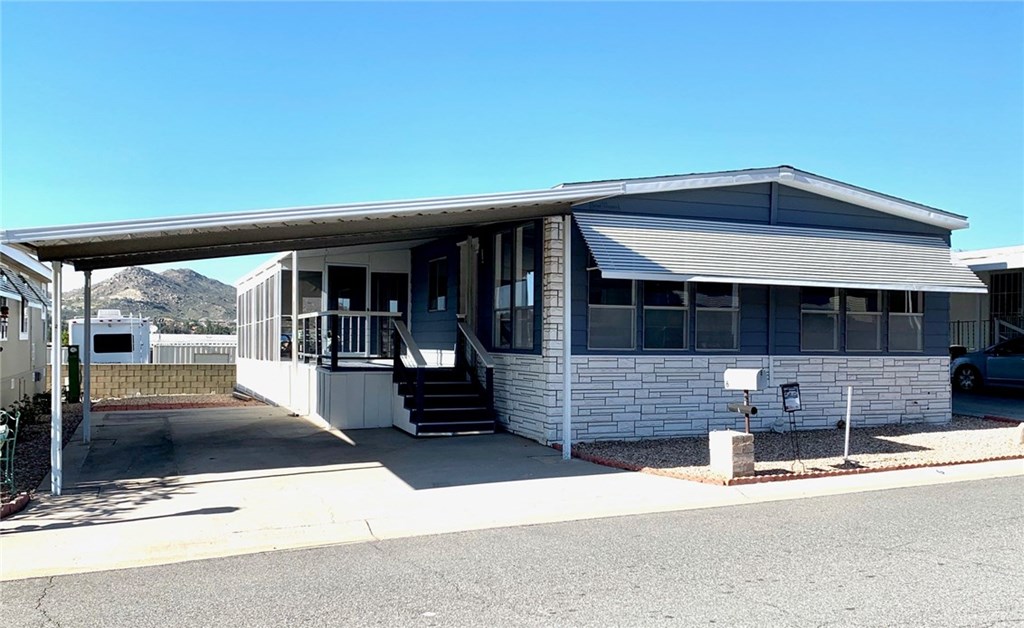 a view of house with outdoor space