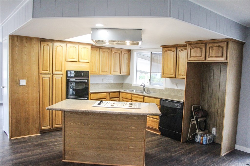 3500 Buchanan Street, Unit 6 Riverside, CA 92503 - Photo 14 of 28 a room with stainless steel appliances granite countertop furniture a refrigerator and sink
