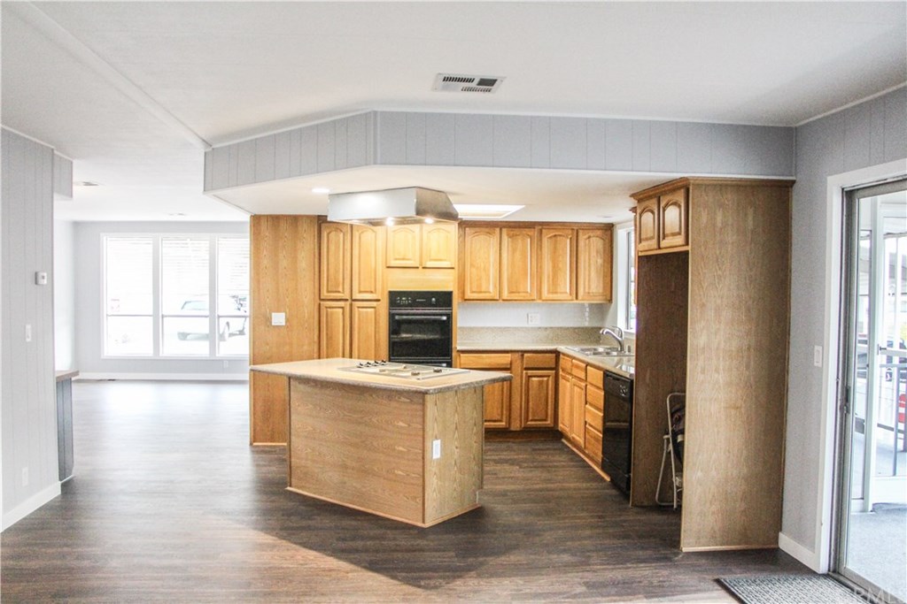3500 Buchanan Street, Unit 6 Riverside, CA 92503 - Photo 15 of 28 a kitchen with stainless steel appliances a stove a sink and a refrigerator