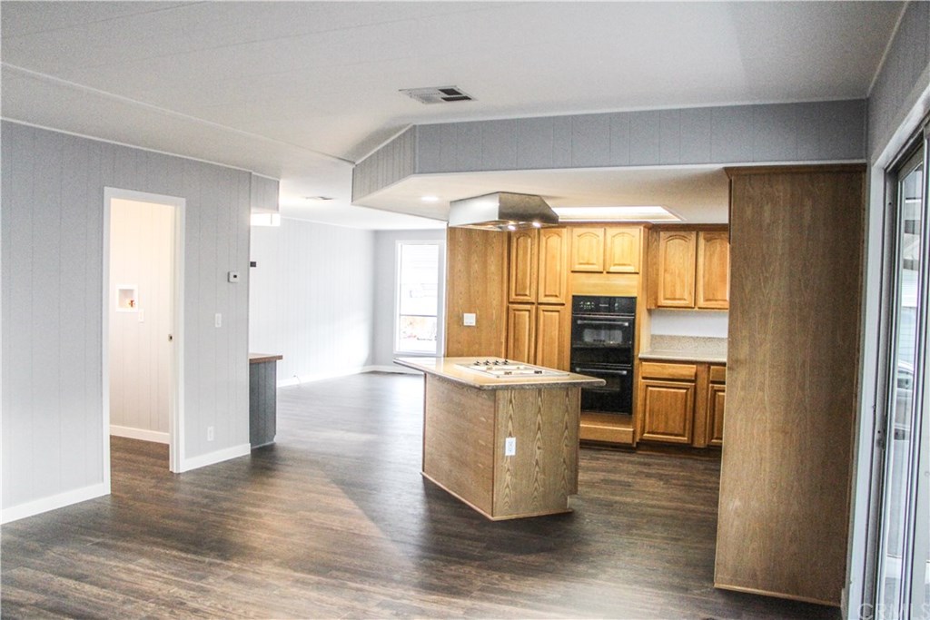 3500 Buchanan Street, Unit 6 Riverside, CA 92503 - Photo 16 of 28 a view of kitchen with stainless steel appliances granite countertop a stove and a refrigerator