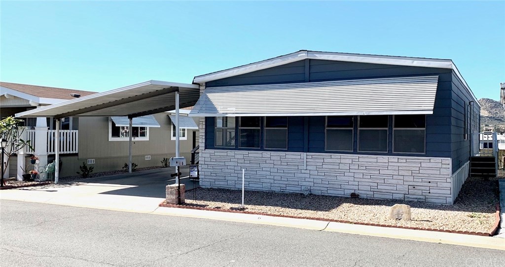 3500 Buchanan Street, Unit 6 Riverside, CA 92503 - Photo 2 of 28 a front view of a house with garage