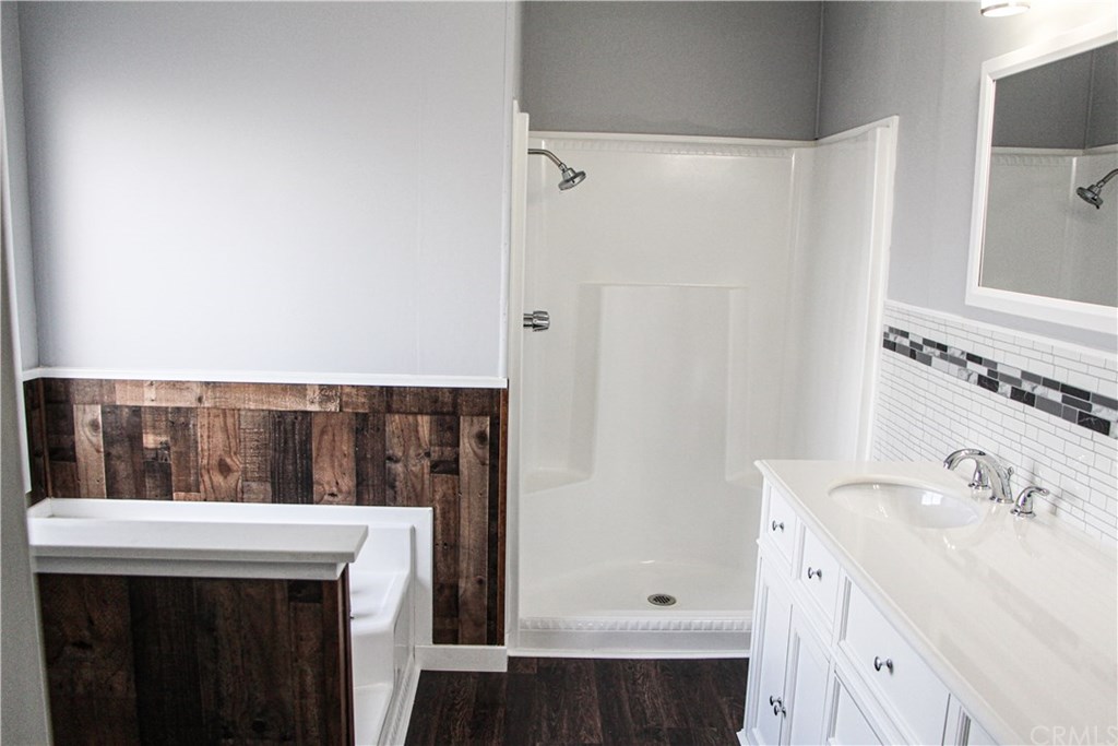 3500 Buchanan Street, Unit 6 Riverside, CA 92503 - Photo 22 of 28 a bathroom with a sink and a mirror