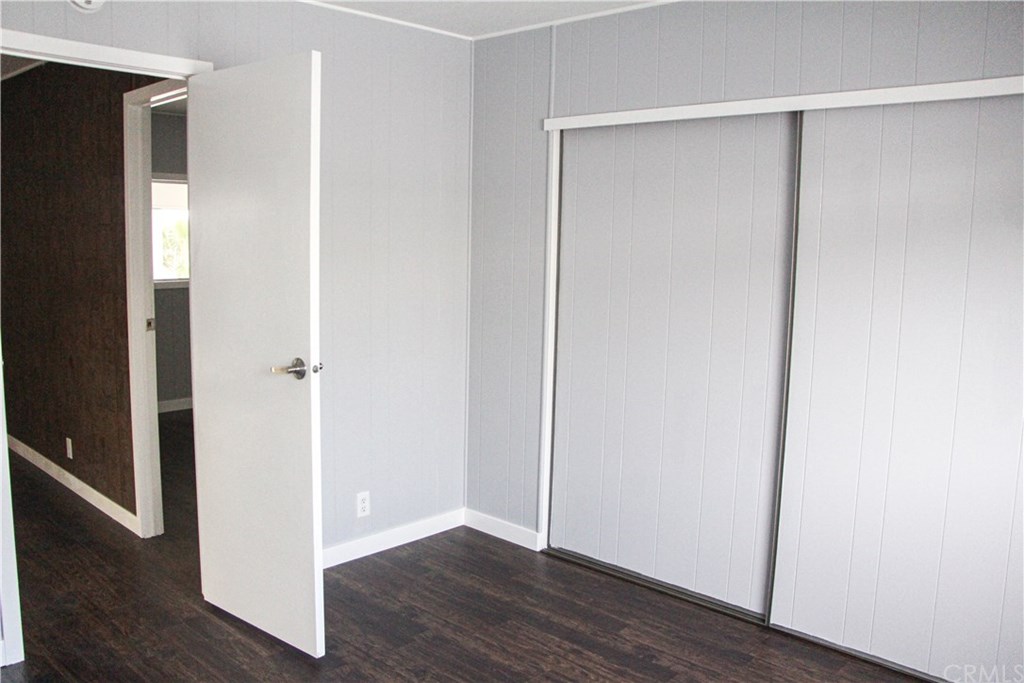 3500 Buchanan Street, Unit 6 Riverside, CA 92503 - Photo 24 of 28 a view of an empty room with wooden floor