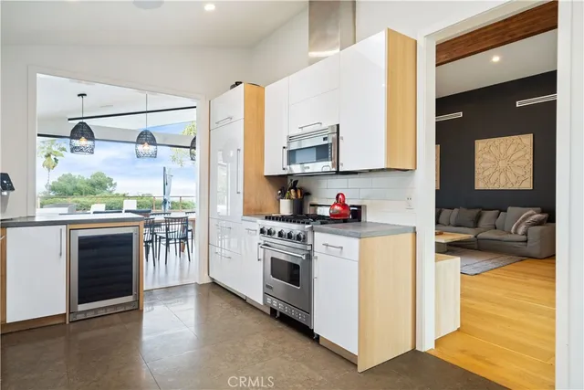 a bathroom with a sink a shower and a mirror