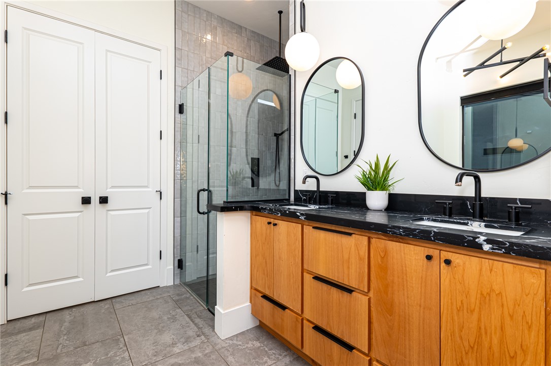3783 Ramsey Road Bullhead City, AZ 86442 - Photo 23 of 56 a bathroom with a sink and a mirror