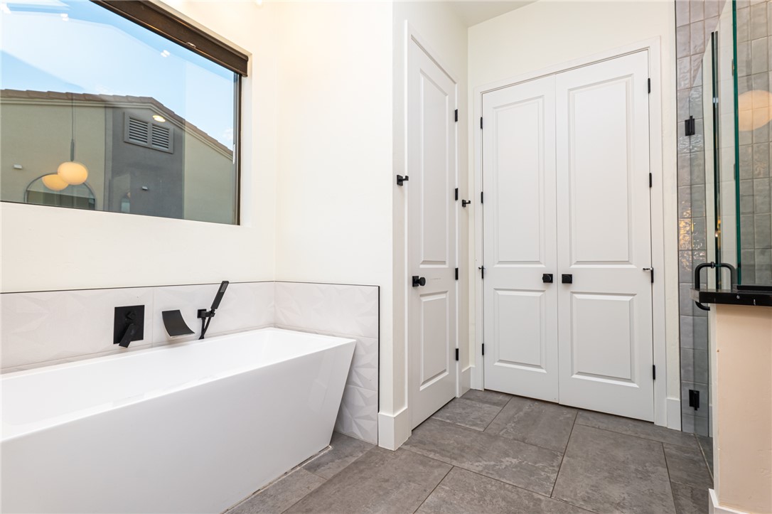 3783 Ramsey Road Bullhead City, AZ 86442 - Photo 24 of 56 a bathroom with a tub and shower