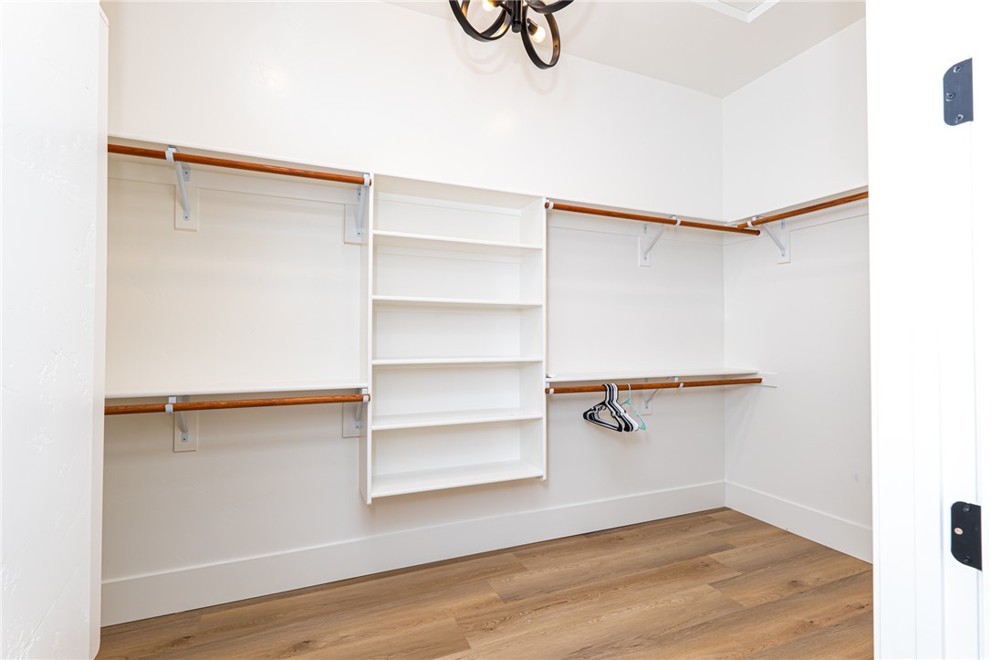 3783 Ramsey Road Bullhead City, AZ 86442 - Photo 27 of 56 a view of walk in closet with empty racks