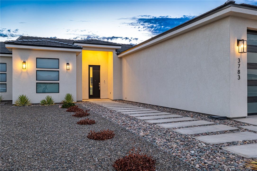 3783 Ramsey Road Bullhead City, AZ 86442 - Photo 3 of 56 a view of a house with a backyard