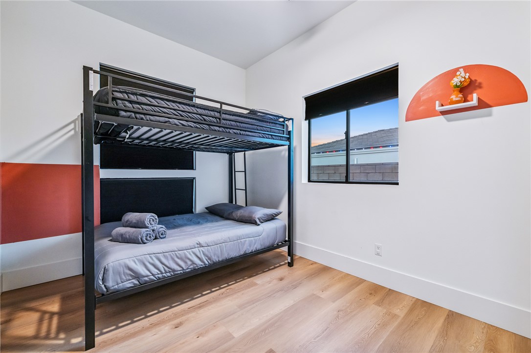 3783 Ramsey Road Bullhead City, AZ 86442 - Photo 31 of 56 a bedroom with a bed and a painting on the wall