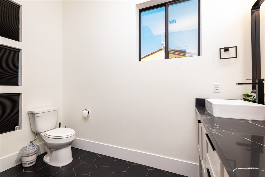 3783 Ramsey Road Bullhead City, AZ 86442 - Photo 33 of 56 a bathroom with a toilet and a sink