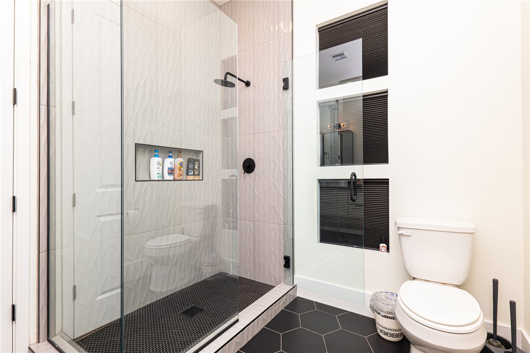 3783 Ramsey Road Bullhead City, AZ 86442 - Photo 34 of 56 a bathroom with a toilet and a shower