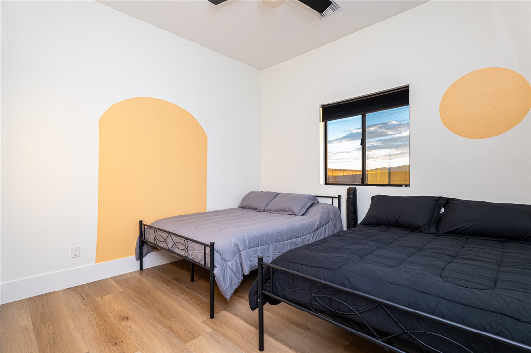 3783 Ramsey Road Bullhead City, AZ 86442 - Photo 37 of 56 a bedroom with a bed and window
