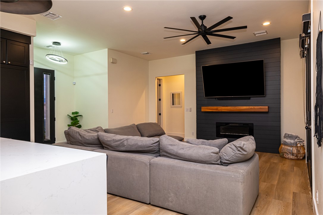 3783 Ramsey Road Bullhead City, AZ 86442 - Photo 4 of 56 a living room with furniture and a flat screen tv