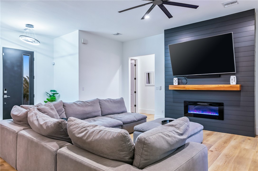 3783 Ramsey Road Bullhead City, AZ 86442 - Photo 5 of 56 a living room with furniture and a flat screen tv