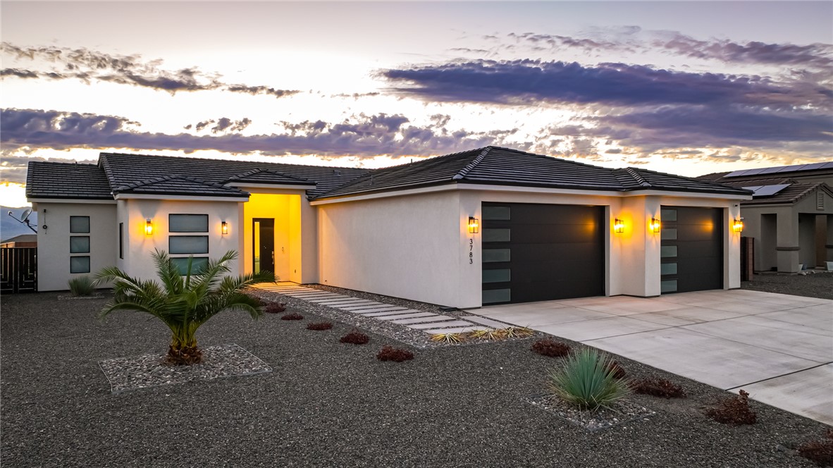3783 Ramsey Road Bullhead City, AZ 86442 - Photo 55 of 56 a front view of house with yard