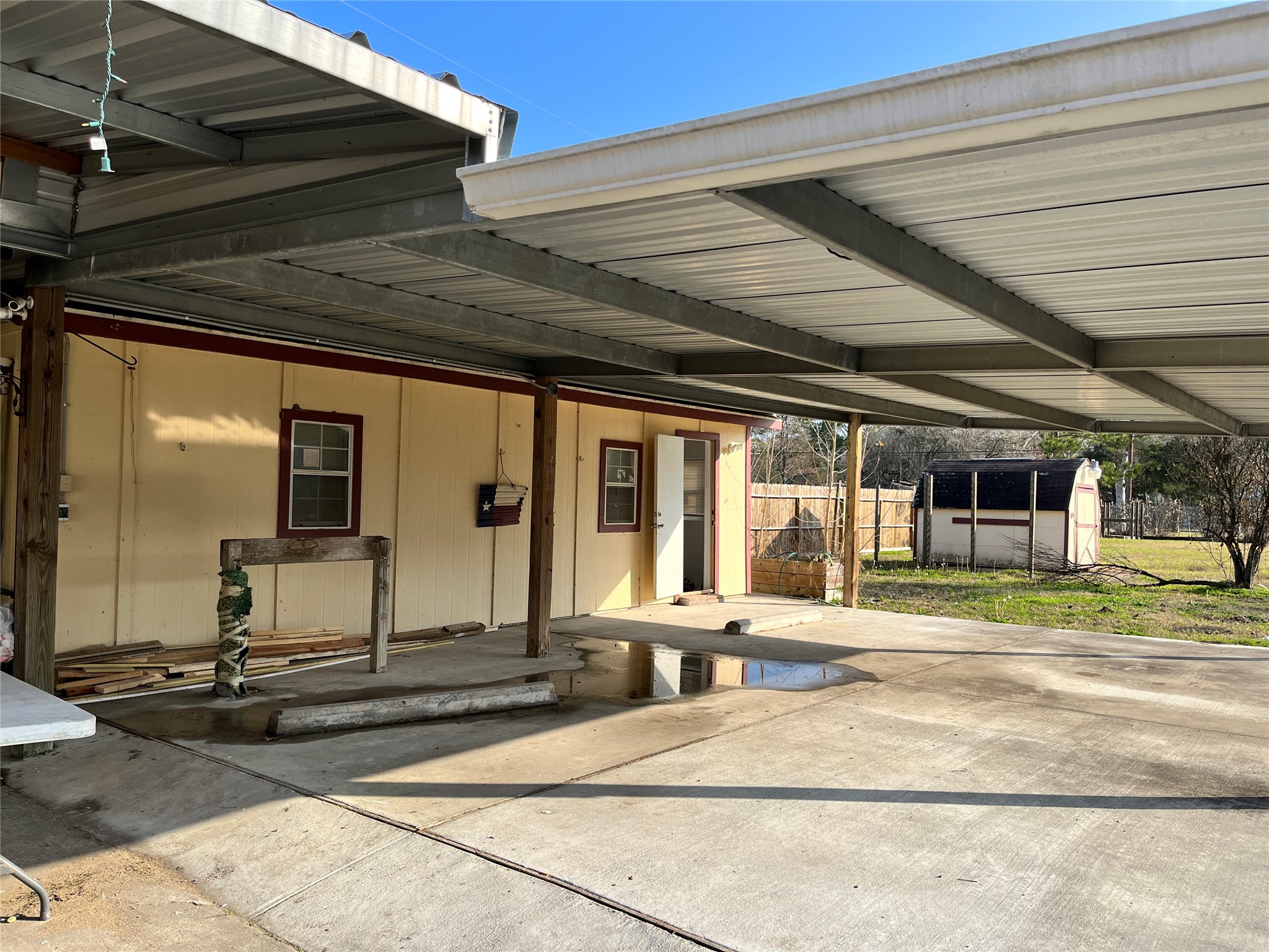 5104 39th Street East, Unit 4 Dickinson, TX 77539 - Photo 2 of 7 a building exterior with furniture