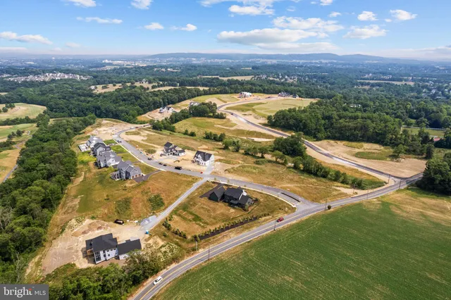 a view of a table & a fireplace