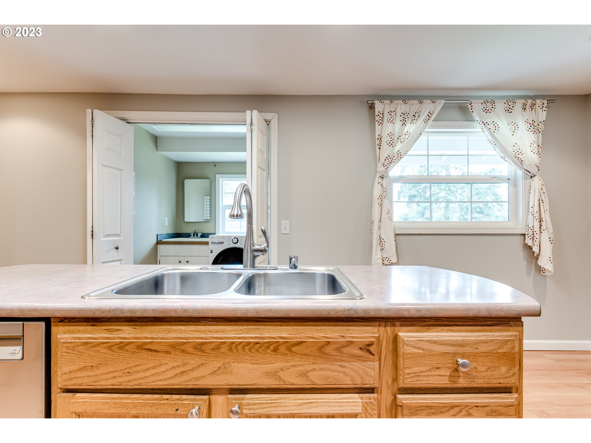 6973 Glacier Drive Springfield, OR 97478 - Photo 10 of 34 a view living room with kitchen island granite countertop furniture and fireplace