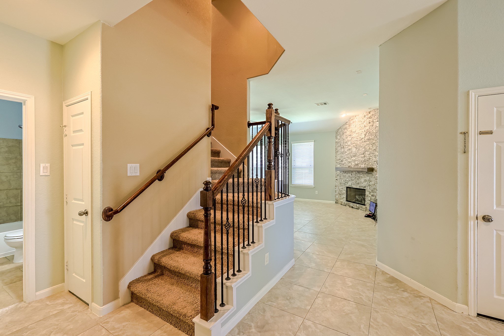 6014 Watford Bend Rosenberg, TX 77471 - Photo 3 of 36 a view of entryway and hall with wooden floor