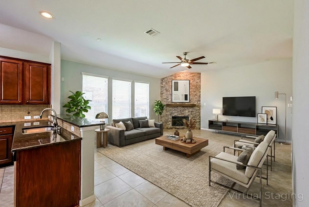 6014 Watford Bend Rosenberg, TX 77471 - Photo 5 of 36 a living room with furniture fireplace and a flat screen tv