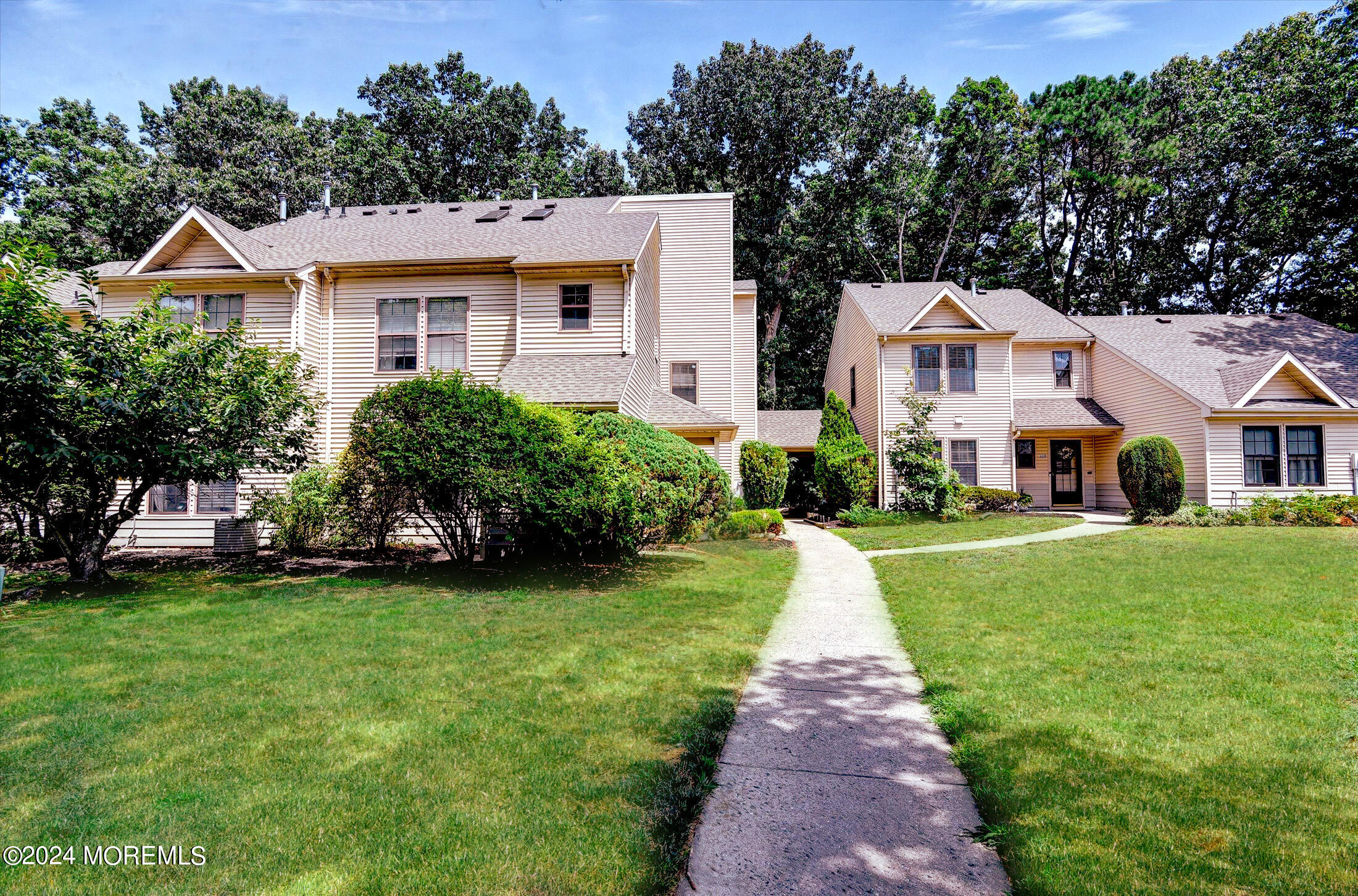 116 Azalea Circle Jackson, NJ 08527 - Photo 1 of 37 a front view of a house with a yard