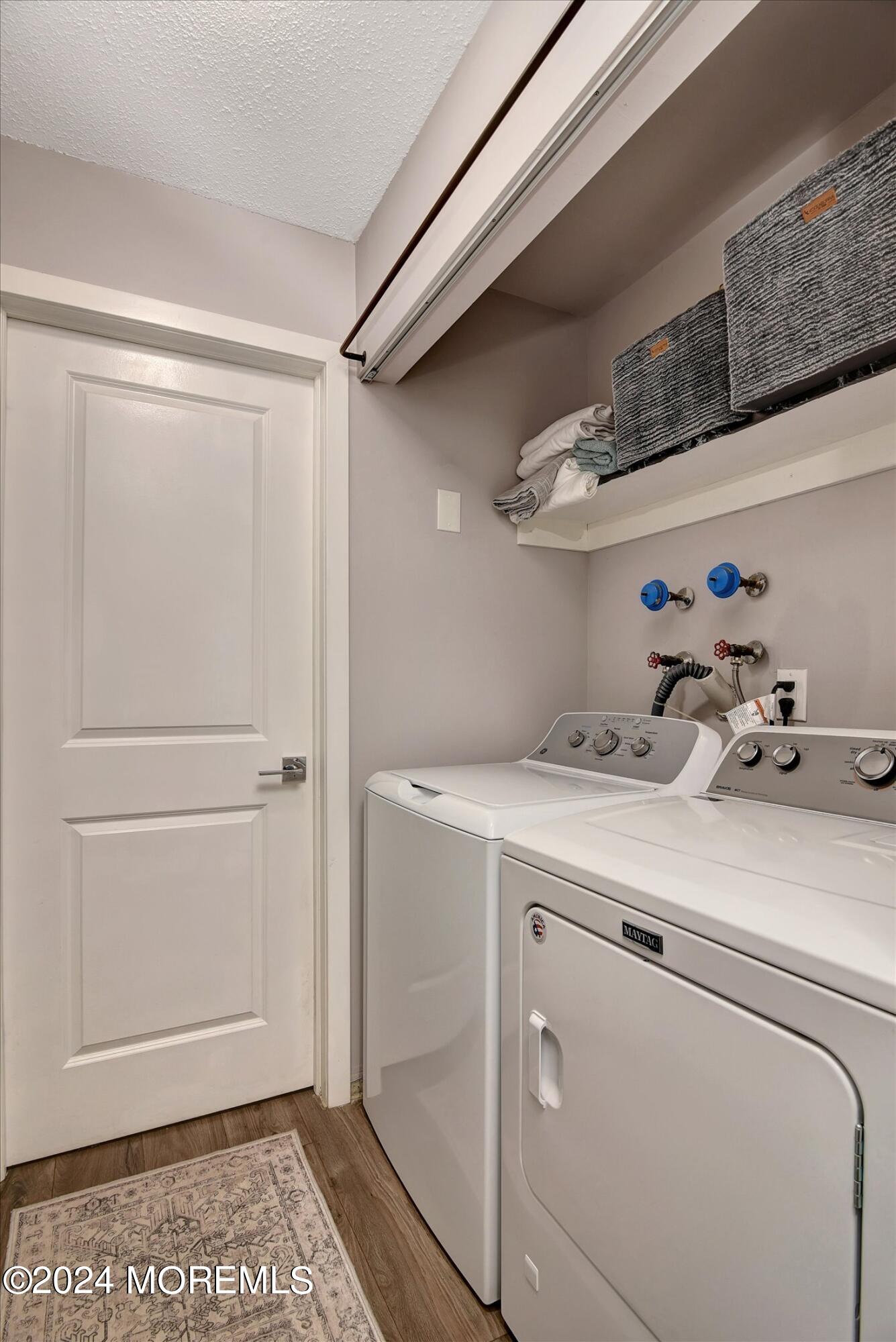 116 Azalea Circle Jackson, NJ 08527 - Photo 26 of 37 a utility room with dryer and washer