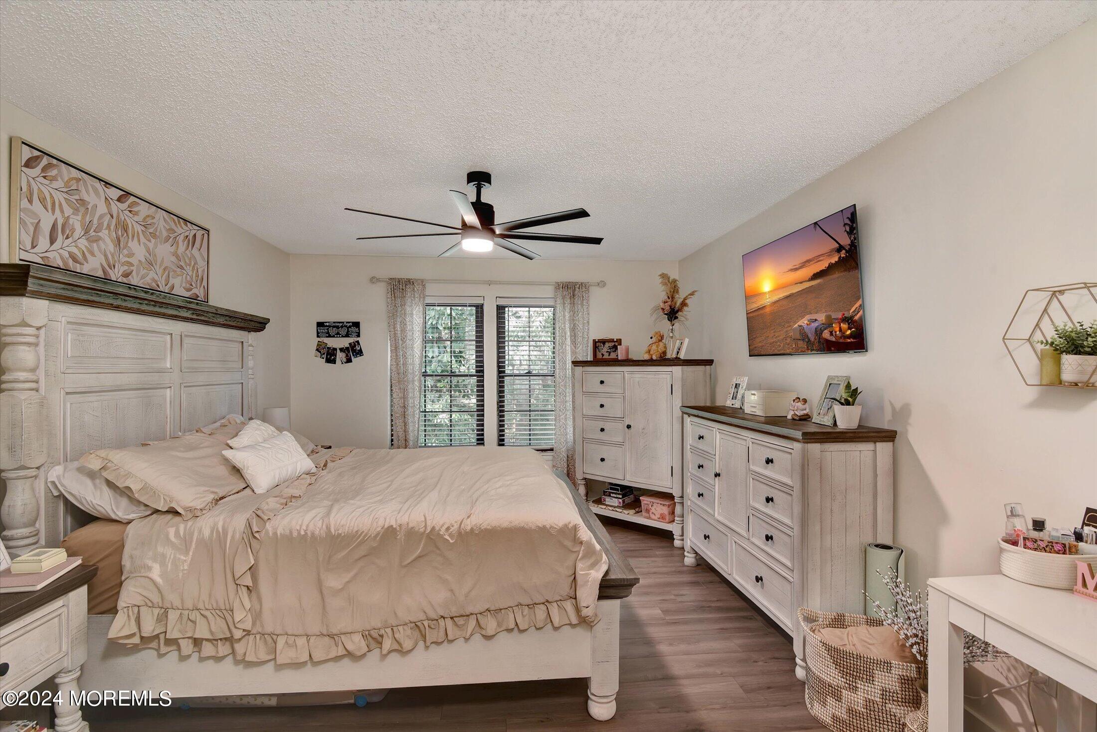 116 Azalea Circle Jackson, NJ 08527 - Photo 29 of 37 a bedroom with a bed and window