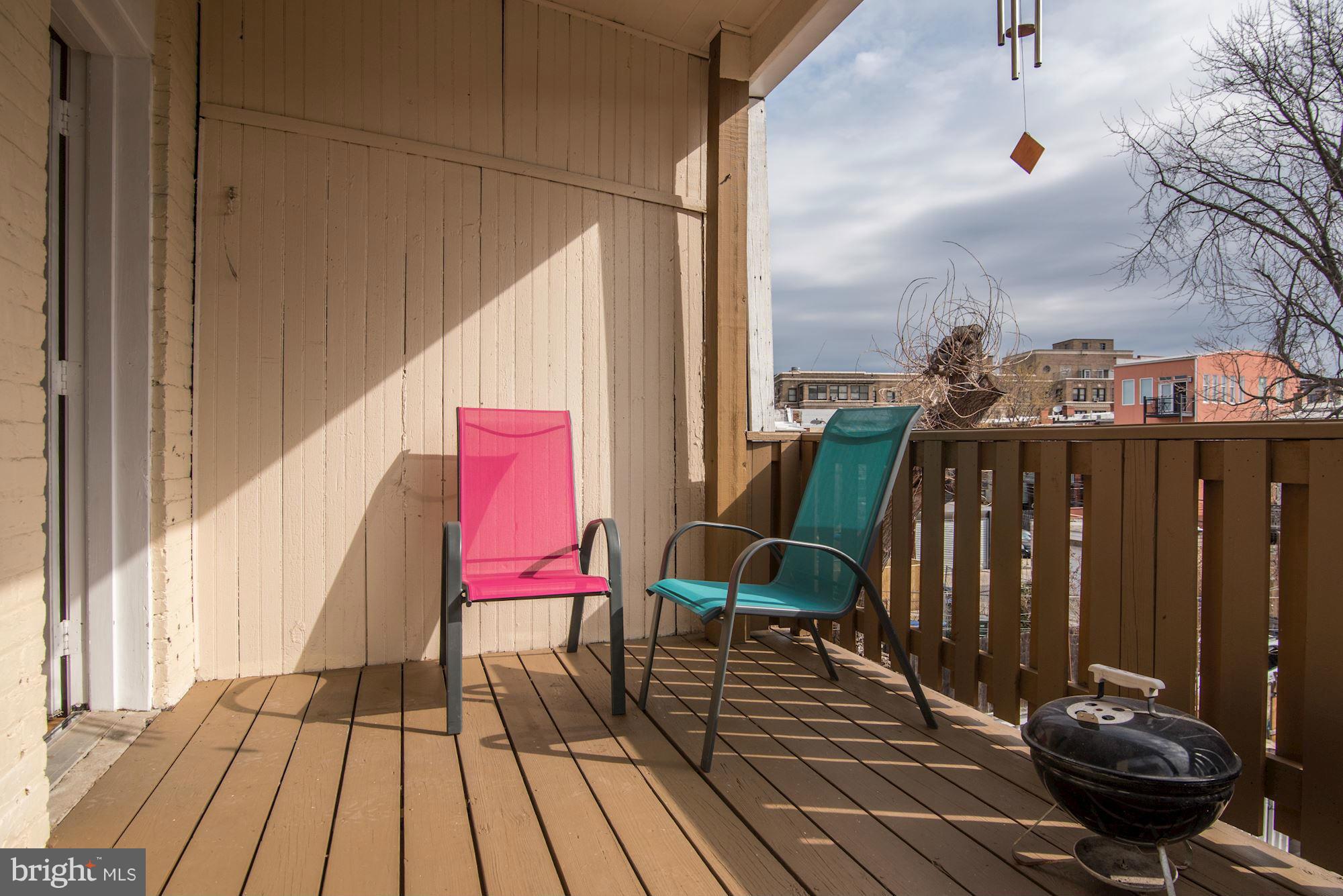 3633 13th Street Northwest Washington, DC 20010 - Photo 22 of 30 a view of deck with chairs and wooden floor